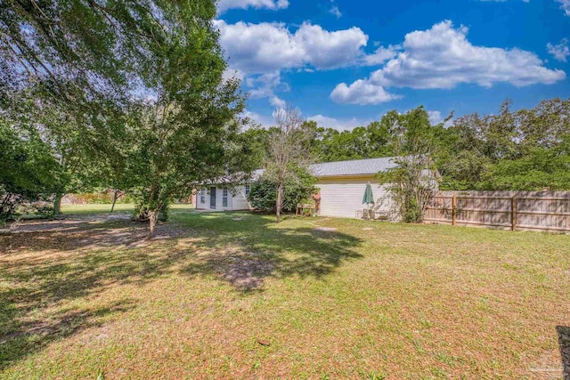 view of yard featuring fence