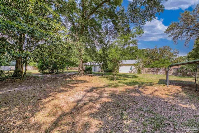 view of yard with fence
