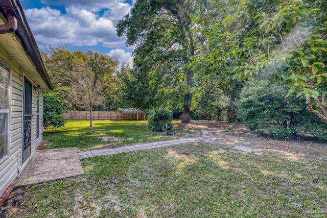 view of yard featuring fence