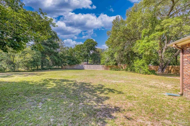 view of yard featuring fence