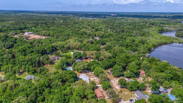 bird's eye view featuring a water view and a view of trees
