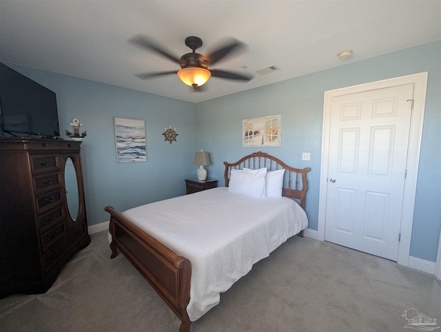 bedroom featuring carpet flooring, a ceiling fan, and baseboards