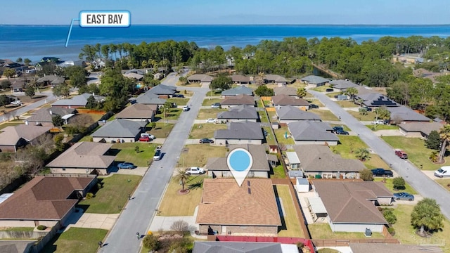 aerial view with a water view and a residential view