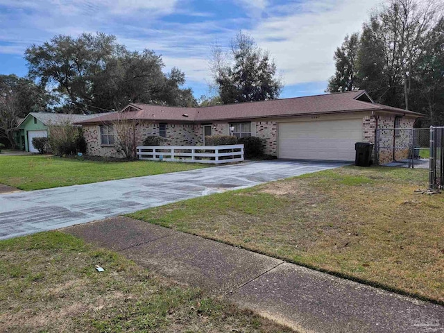 ranch-style house with a front yard and a garage