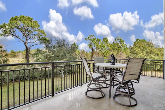 balcony featuring outdoor dining space