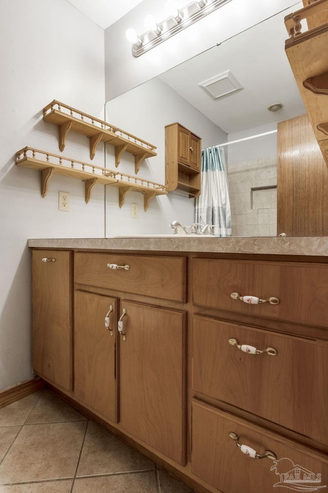 bathroom featuring tile patterned flooring, backsplash, and walk in shower