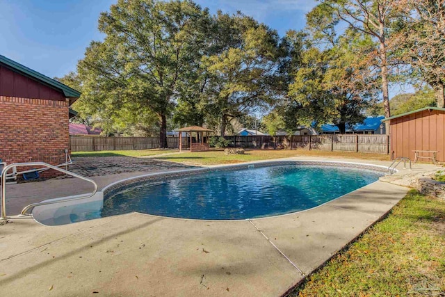 view of swimming pool featuring a gazebo, a lawn, and a patio area