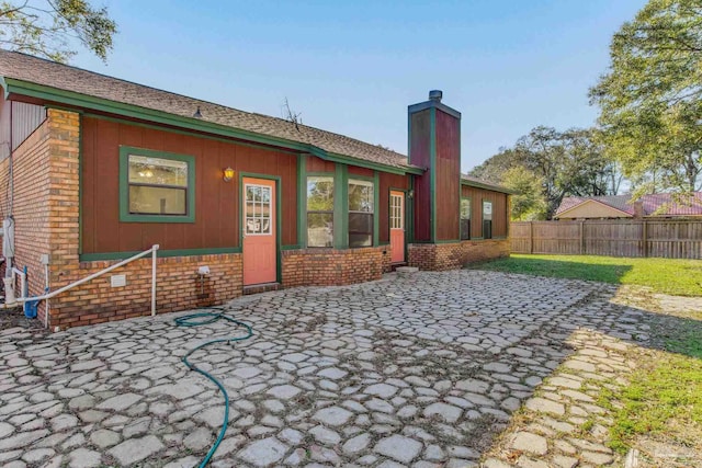 rear view of property with a patio