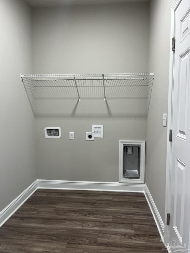 washroom featuring laundry area, electric dryer hookup, washer hookup, and dark wood-style flooring