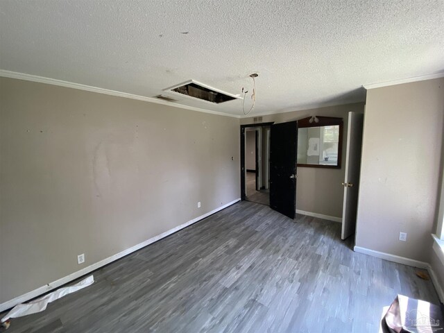 living room with a textured ceiling and hardwood / wood-style flooring