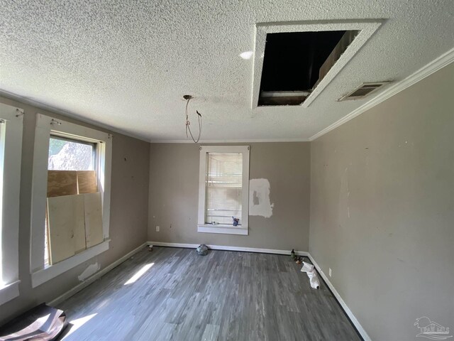 bedroom featuring hardwood / wood-style flooring and crown molding