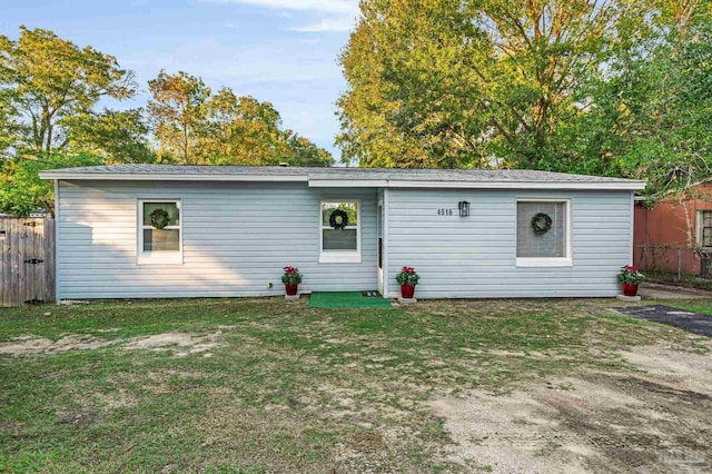 view of front of home with a front lawn