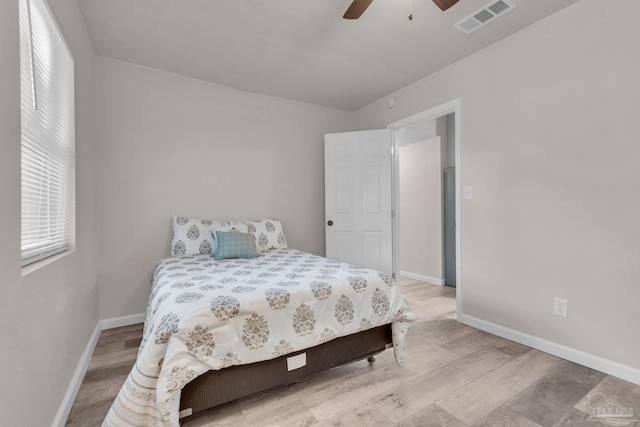 bedroom featuring ceiling fan and light hardwood / wood-style flooring