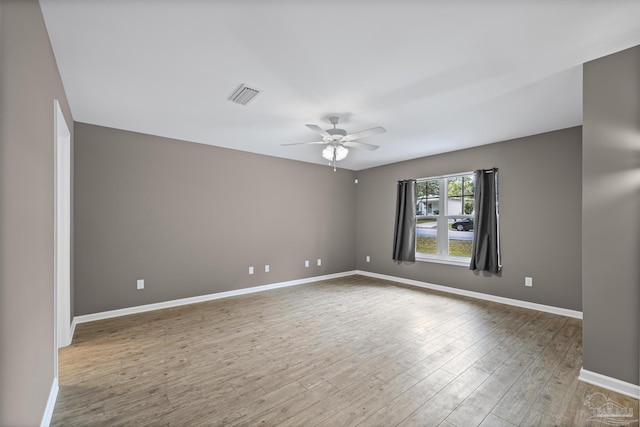 6609 Cedar St, Milton, FL 32570 - spare room with ceiling fan and wood finished floors