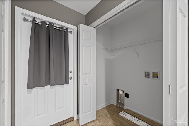 6609 Cedar St, Milton, FL 32570 - laundry area featuring hookup for a washing machine and wood finished floors