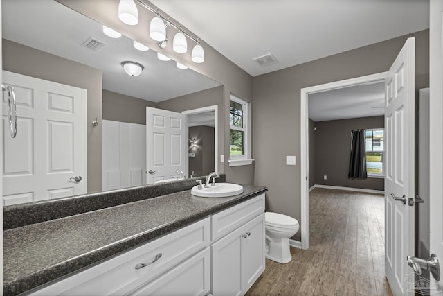 6609 Cedar St, Milton, FL 32570 - bathroom featuring vanity and wood finished floors