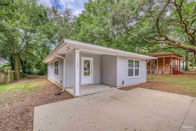 6609 Cedar St, Milton, FL 32570 - view of front of home featuring covered porch