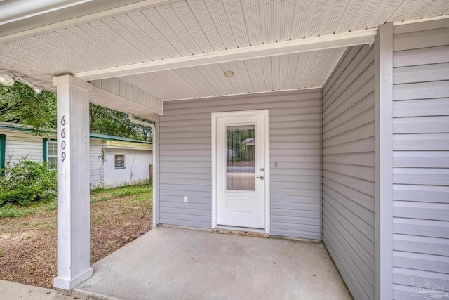 6609 Cedar St, Milton, FL 32570 - doorway to property with a patio