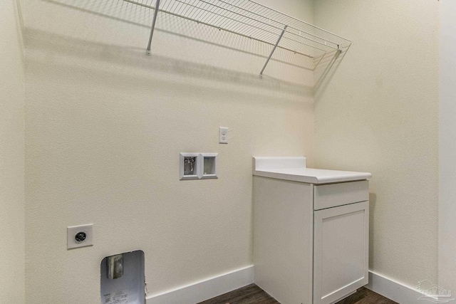 laundry area featuring hookup for a washing machine, hookup for an electric dryer, and dark hardwood / wood-style flooring