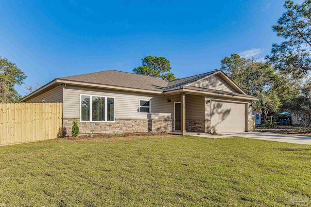 ranch-style home with a garage and a front lawn