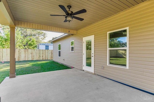 view of patio featuring ceiling fan