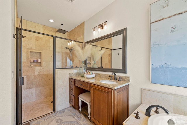 bathroom with vanity and independent shower and bath