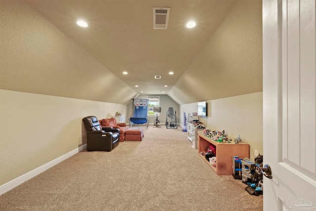 game room featuring vaulted ceiling and carpet