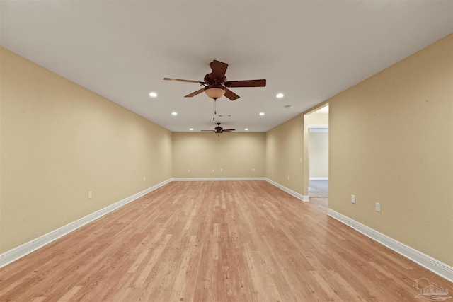 interior space with ceiling fan and light hardwood / wood-style flooring