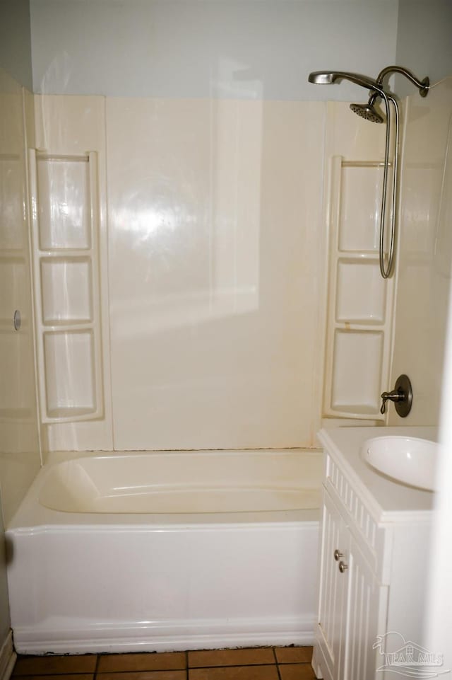 bathroom with tile patterned flooring, vanity, and shower / bath combination