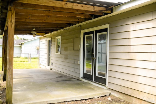 view of patio featuring ceiling fan and french doors