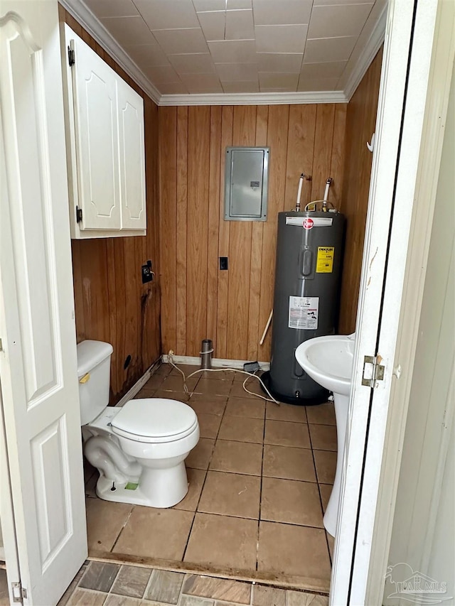 half bathroom with toilet, wood walls, water heater, electric panel, and tile patterned floors