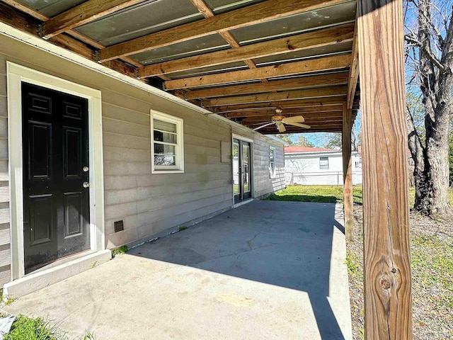 view of patio featuring a ceiling fan