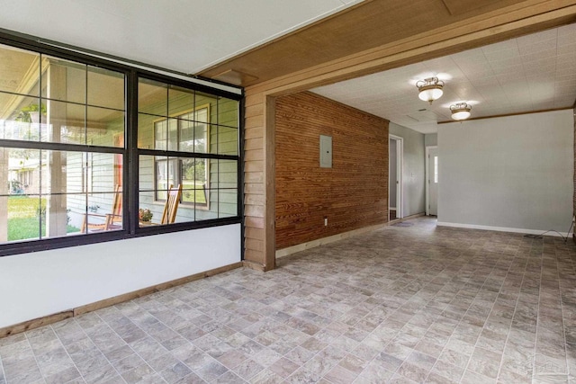 empty room with wood walls