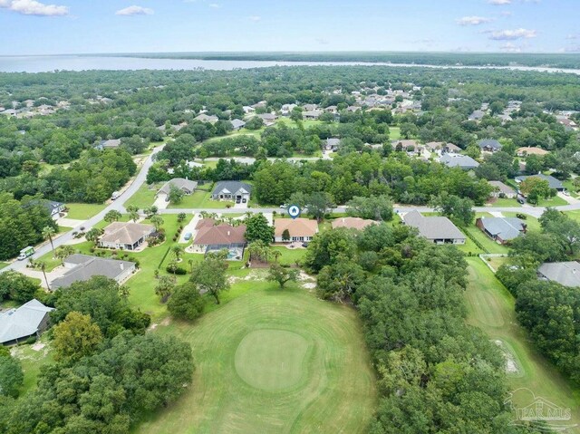7008 Turnberry Cir, Navarre, FL 32566 - drone / aerial view featuring a residential view, a water view, and view of golf course
