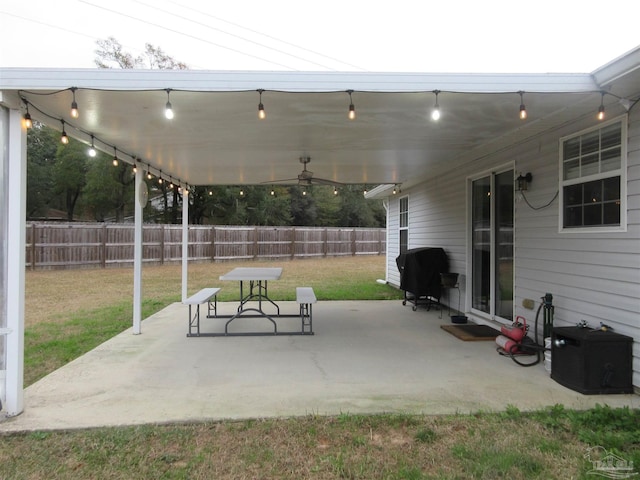 view of patio with grilling area and ceiling fan