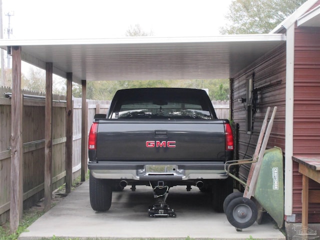 view of parking / parking lot with a carport