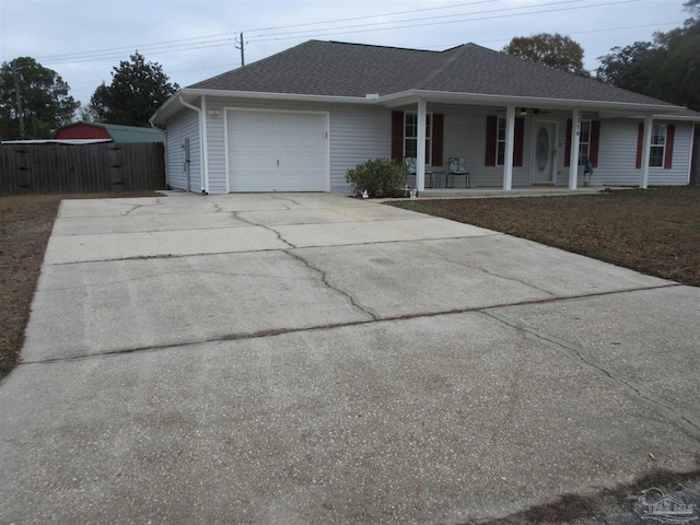 view of front of house featuring a porch and a garage