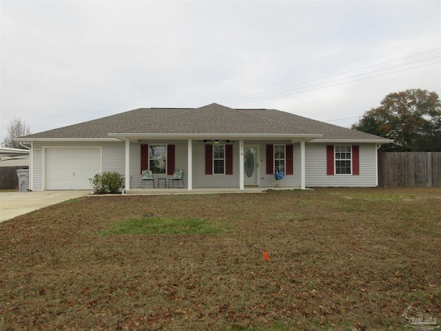 single story home with a porch, a garage, and a front lawn