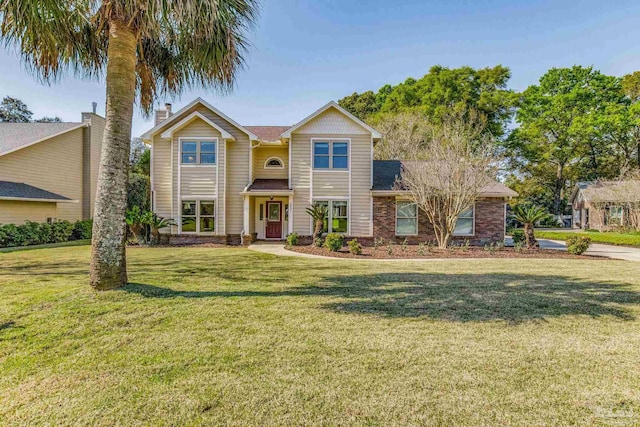 view of front of home with a front lawn