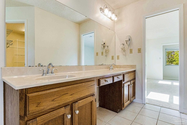 bathroom featuring vanity and tile patterned flooring