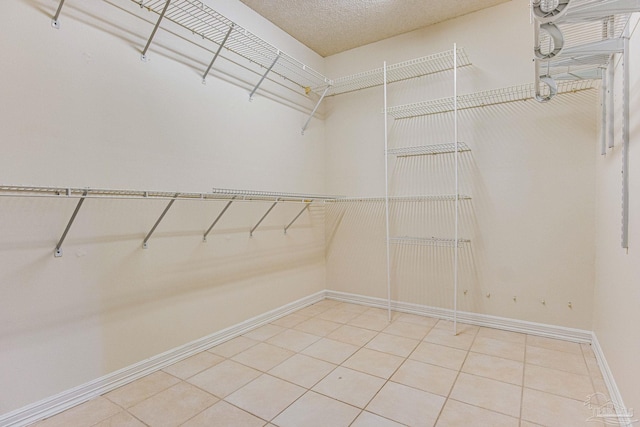 walk in closet featuring tile patterned floors