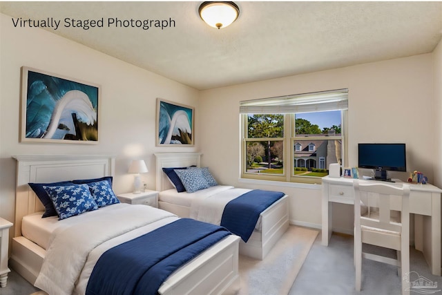 bedroom with light carpet