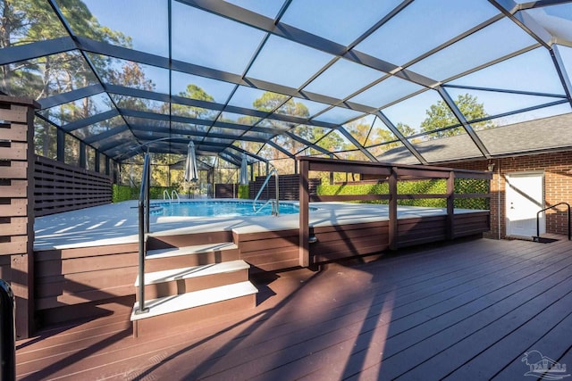 wooden terrace featuring a lanai