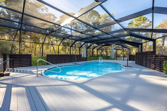 view of pool featuring pool water feature and a lanai