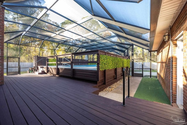 wooden deck featuring a lanai