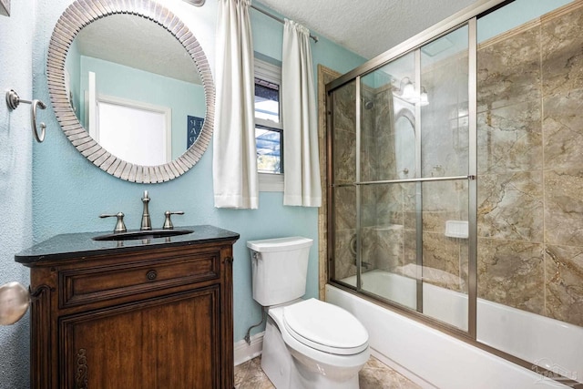 full bathroom featuring shower / bath combination with glass door, a textured ceiling, vanity, and toilet