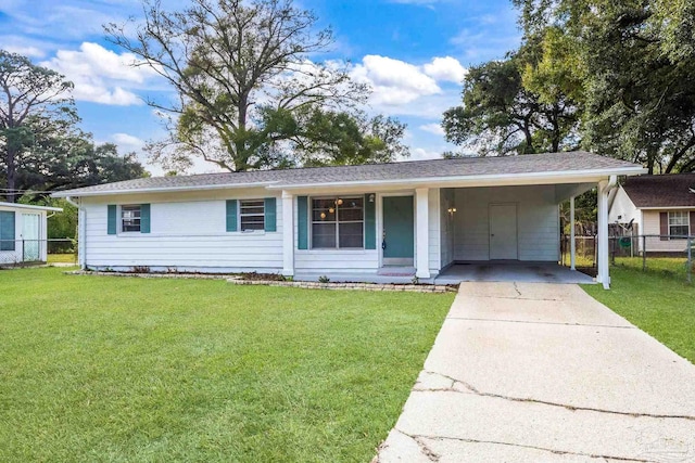 ranch-style home with a front lawn and a carport