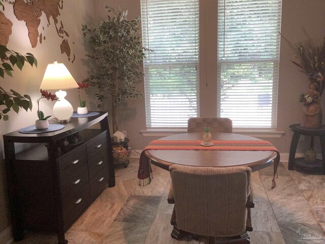 living room with ornamental molding, hardwood / wood-style floors, and ceiling fan