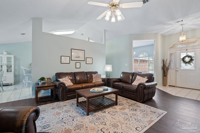 10738 Magnolia Ln, Lillian, AL 36549 - living room featuring ceiling fan, visible vents, wood finished floors, and vaulted ceiling
