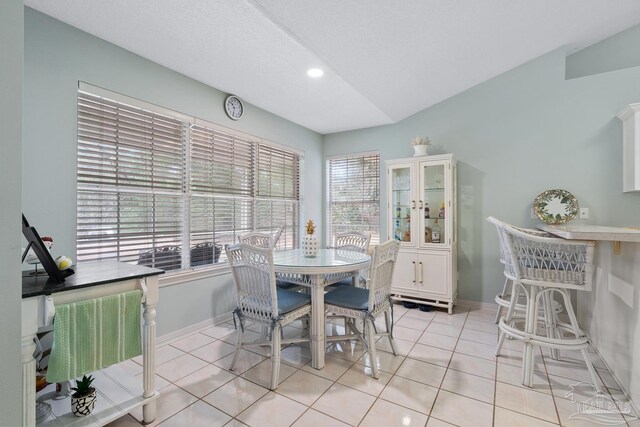 10738 Magnolia Ln, Lillian, AL 36549 - dining room with light tile patterned flooring and baseboards